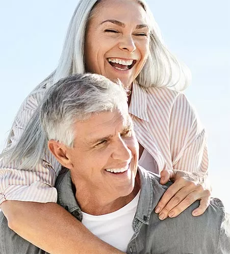 Smiling older couple