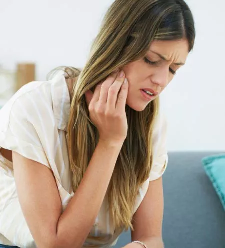Woman with severe toothache